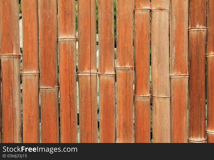 A back ground of textured bamboo shafts in a Japanese Garden. A back ground of textured bamboo shafts in a Japanese Garden.