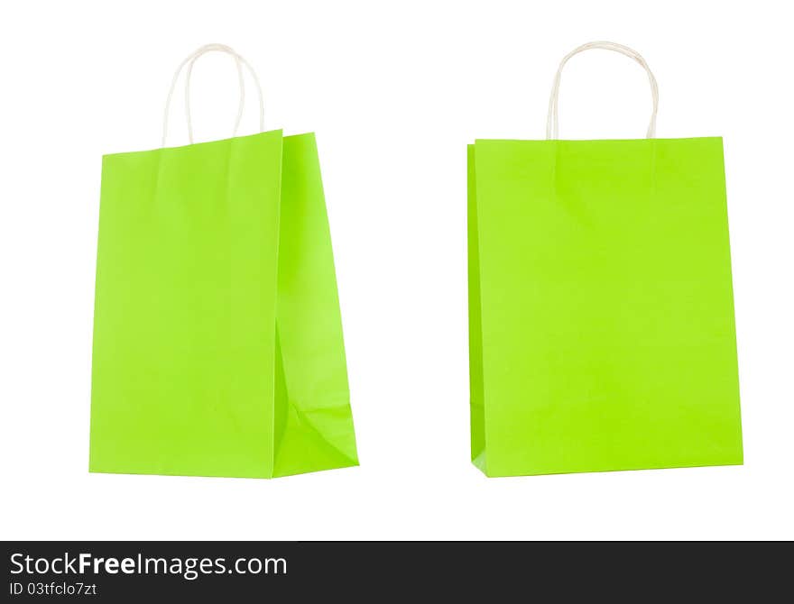 Green shopping bags isolated on white background