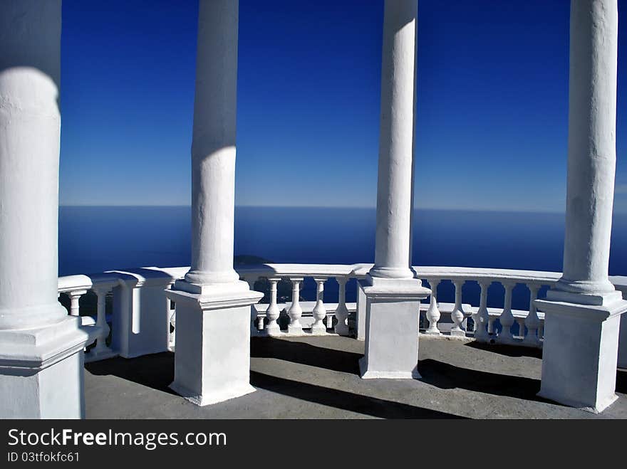 White arbour with the columns