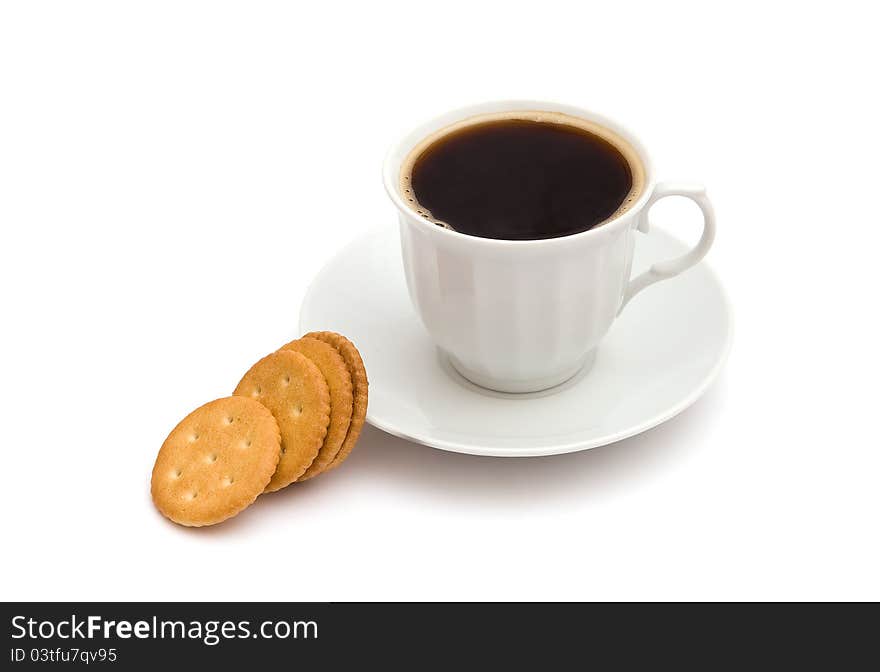 White cup of coffee with crackers on white background