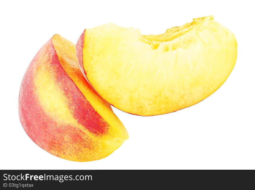 Nectarine fruit segments isolated on white background