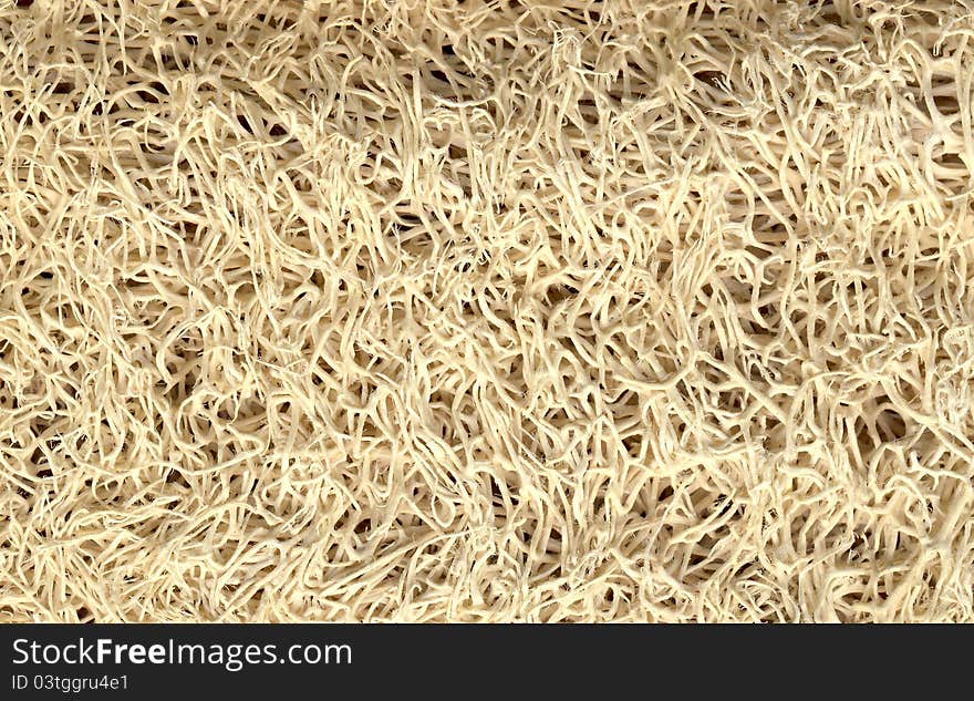 Stock macro photo of the texture of a cleaning sponge. Useful for abstract backgrouds and layer masks. Stock macro photo of the texture of a cleaning sponge. Useful for abstract backgrouds and layer masks.