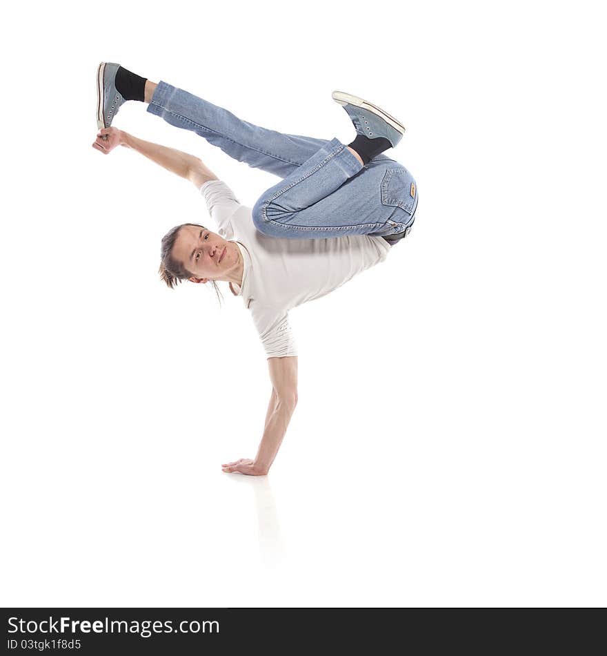 Hip-hop style dancer posing over white background. Hip-hop style dancer posing over white background