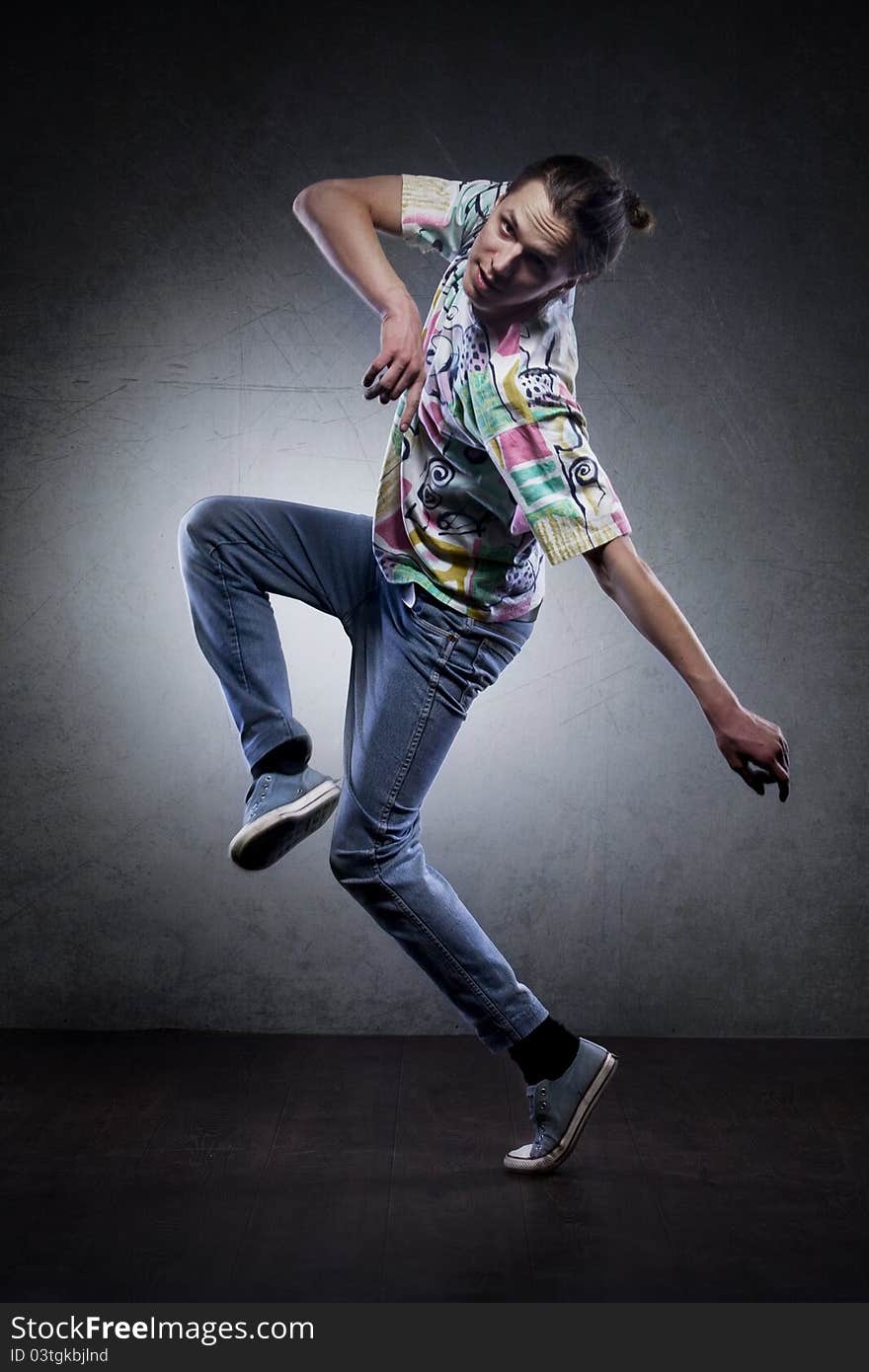 Hip-hop style dancer posing. Hip-hop style dancer posing