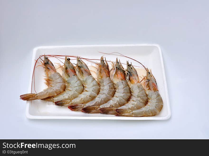 Fresh shrimps on white package. Fresh shrimps on white package