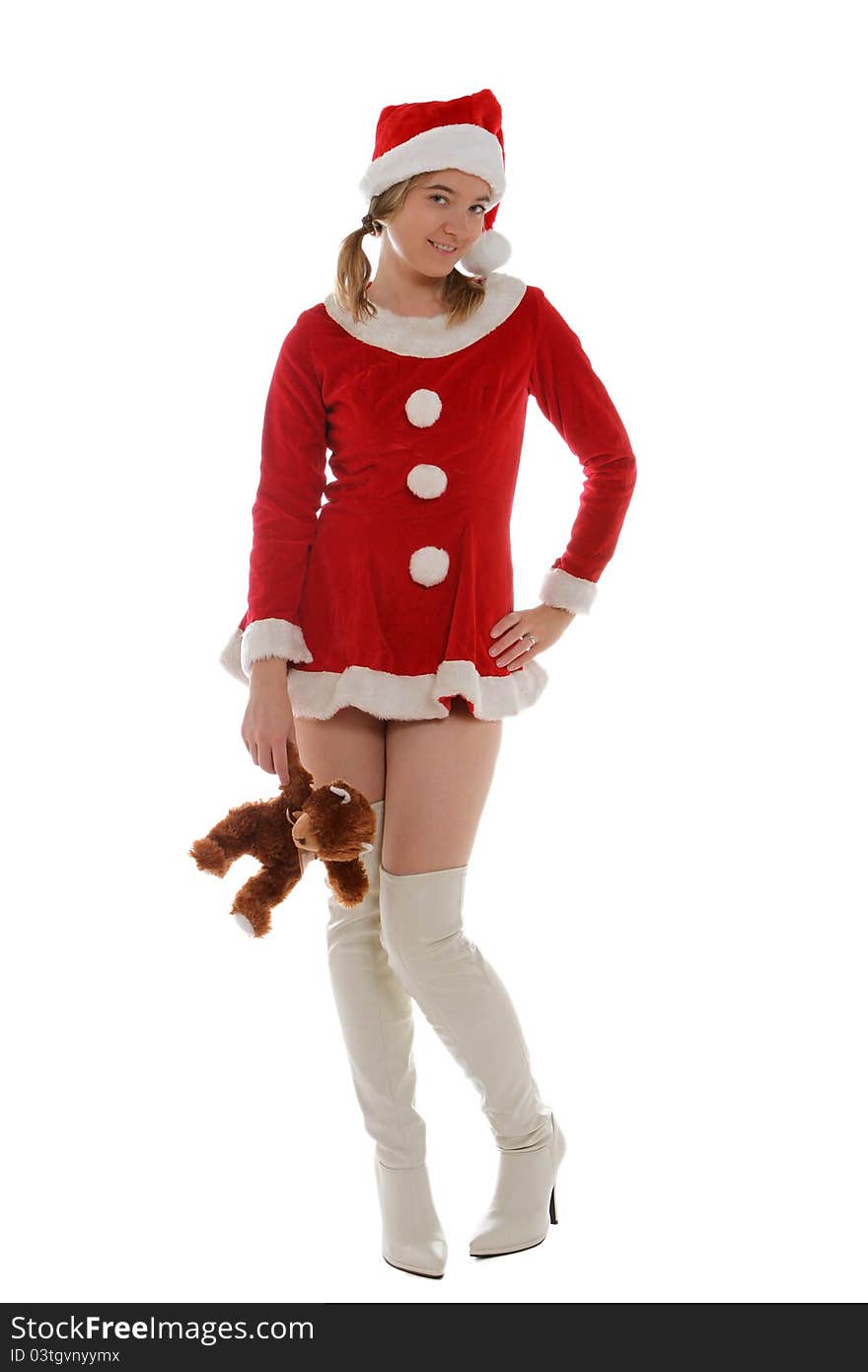 Santa's helper holding a teddy bear. Santa's helper holding a teddy bear