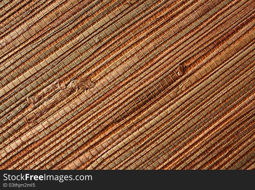 Natural wall-paper from a grass can be used as a background