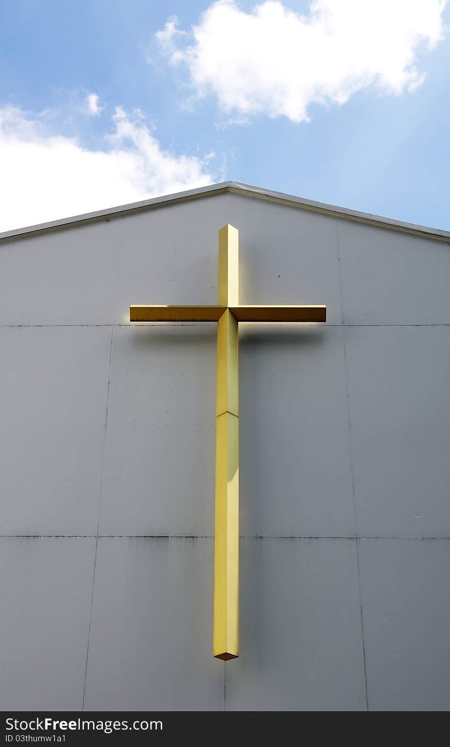 The golden cross at church