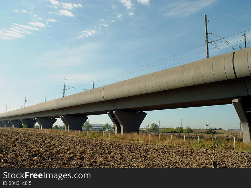 High speed train elevated railway in farmlands