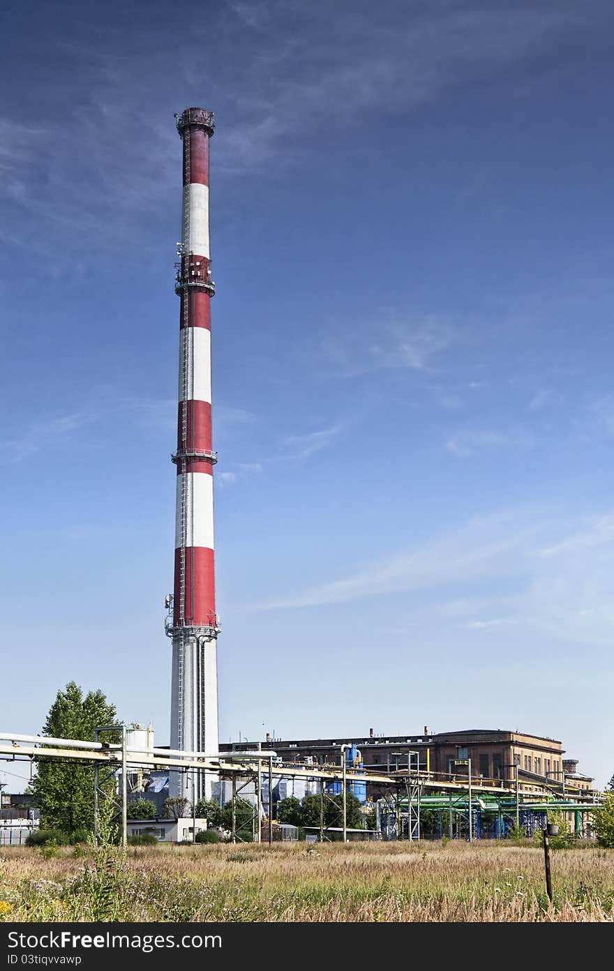 Ironworks with chimney in countryside. Ironworks with chimney in countryside