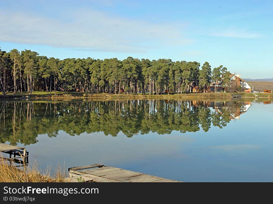 A pacific lake with good reflections near the forest. A pacific lake with good reflections near the forest.