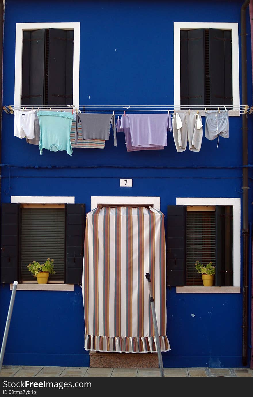 Painted wall in the island of Burano near Venice, Italy. Painted wall in the island of Burano near Venice, Italy