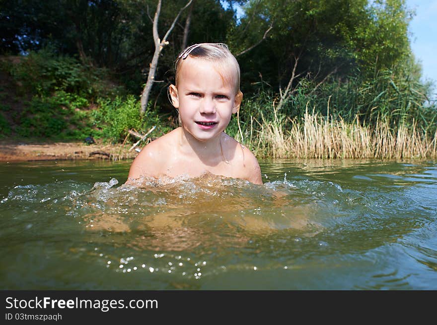 Girl swimming in the lake