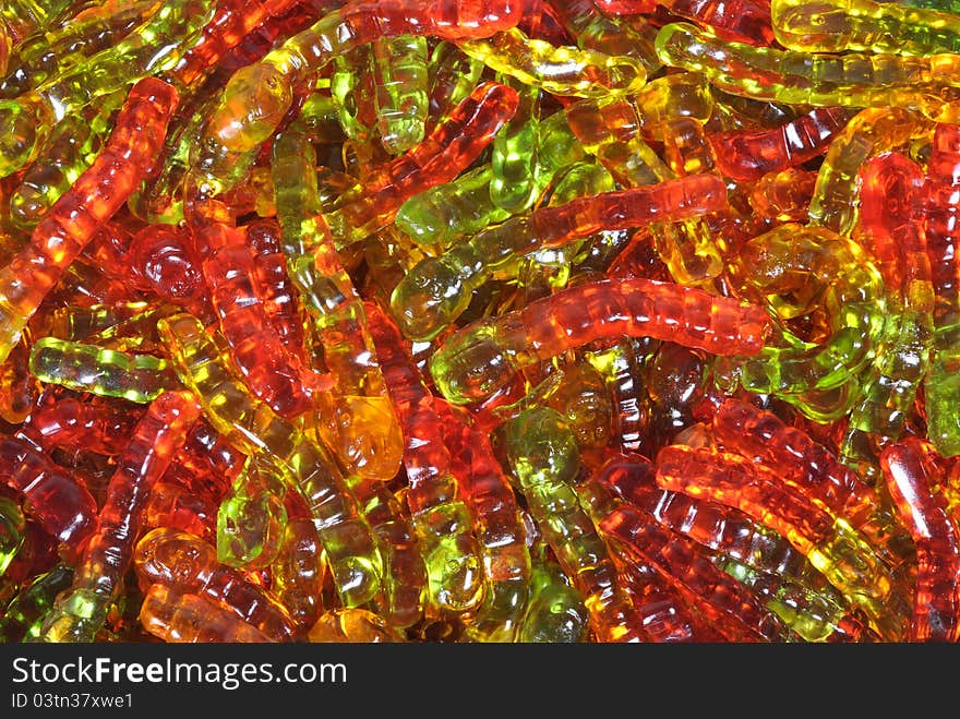 Fruit-jelly worms presented as background