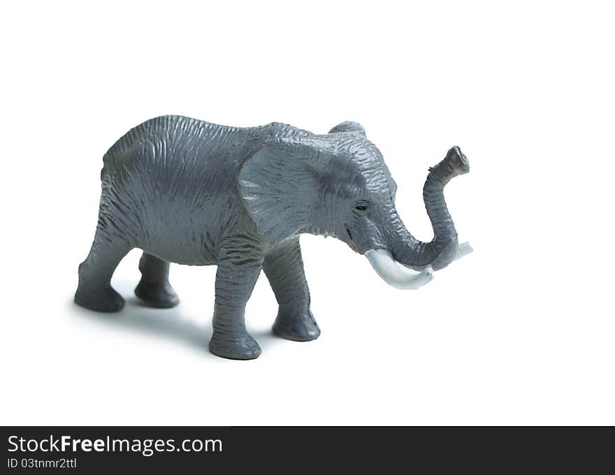 Gray toy elephant isolated on white background