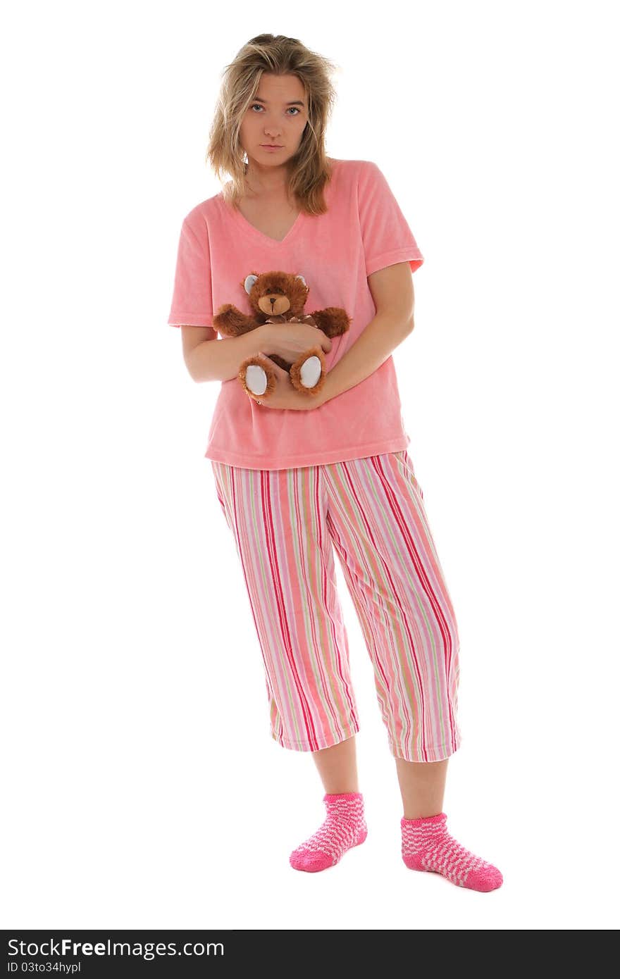 Young lady ready for bed with her teddy bear. Young lady ready for bed with her teddy bear