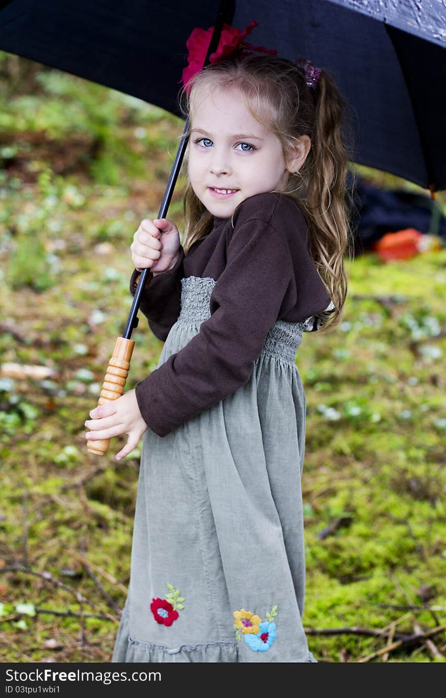 Young girl with umbrella