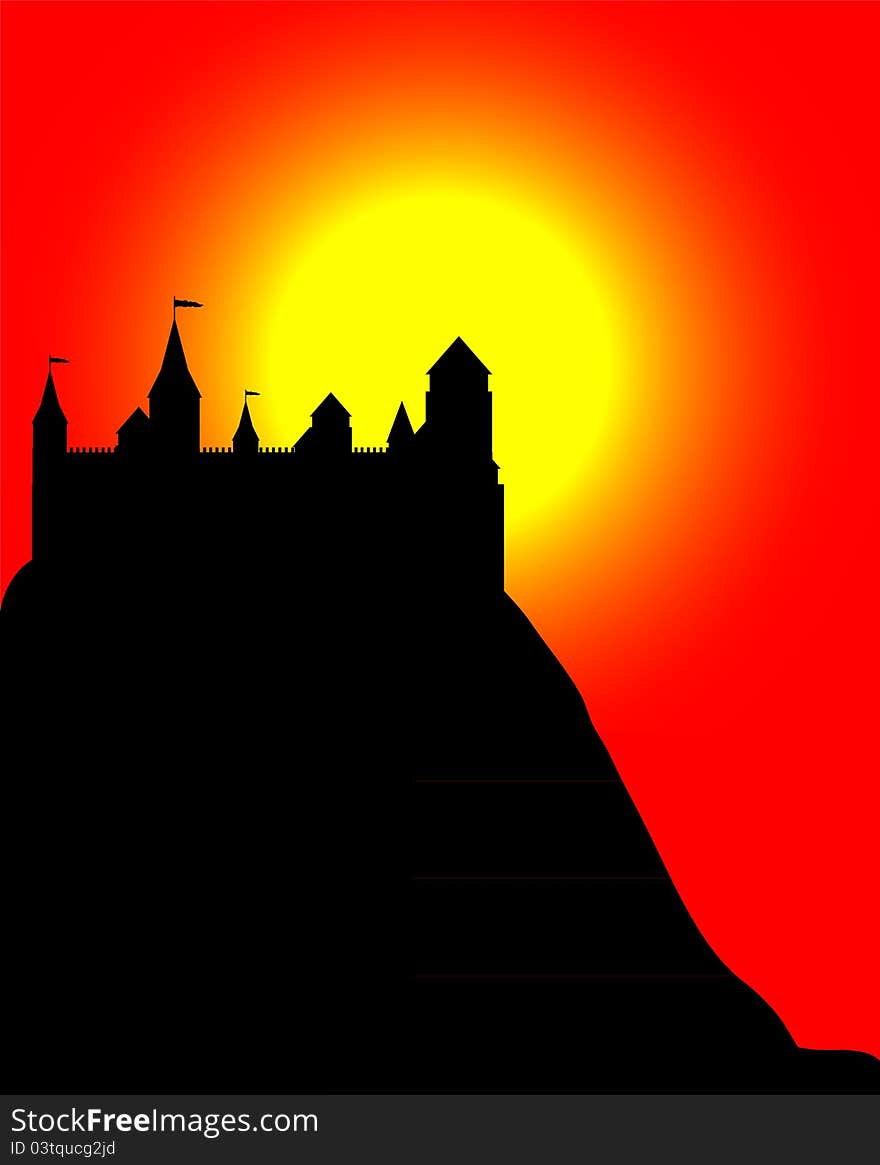 Black silhouette of the castle on a high hill at sunset