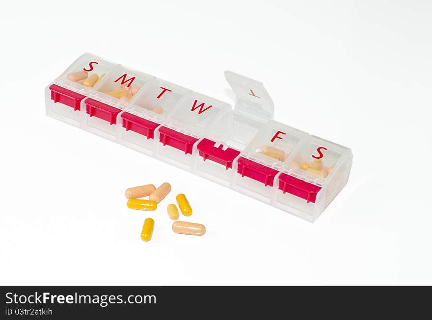 Pill container used to distribute daily medication. Pill container used to distribute daily medication