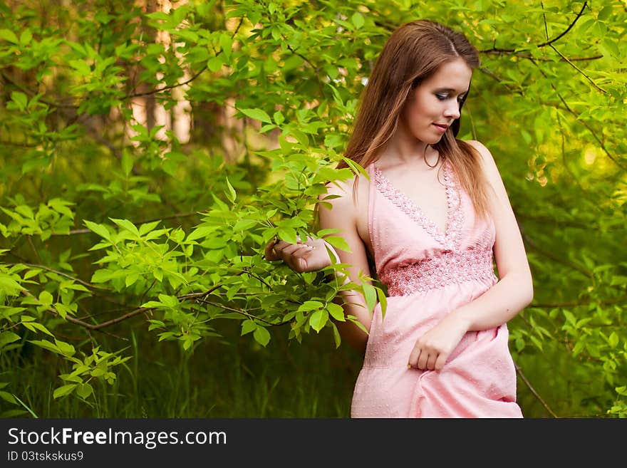 Pretty young girl in the forest