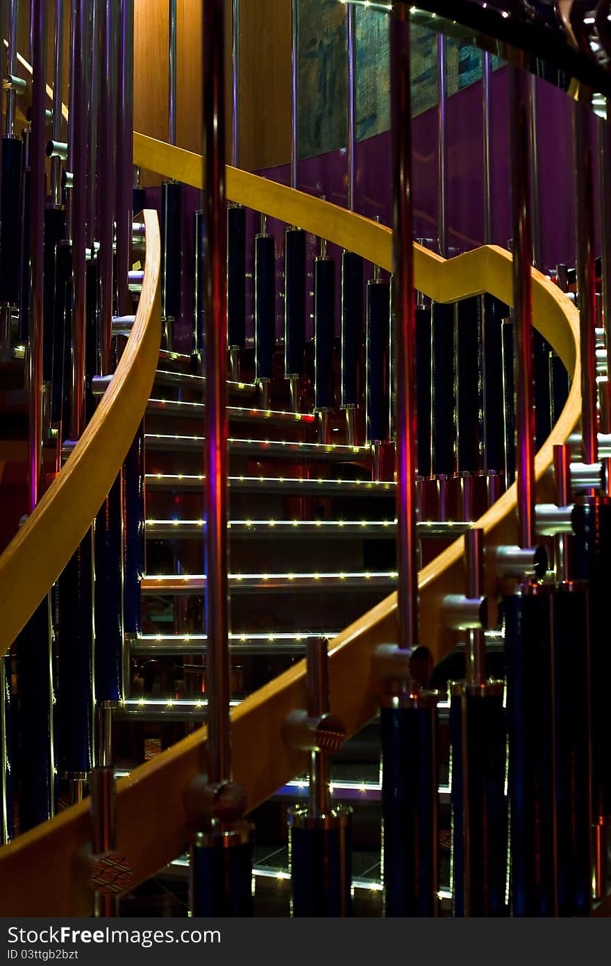 Illuminated spiral steps in disco club on cruise liner