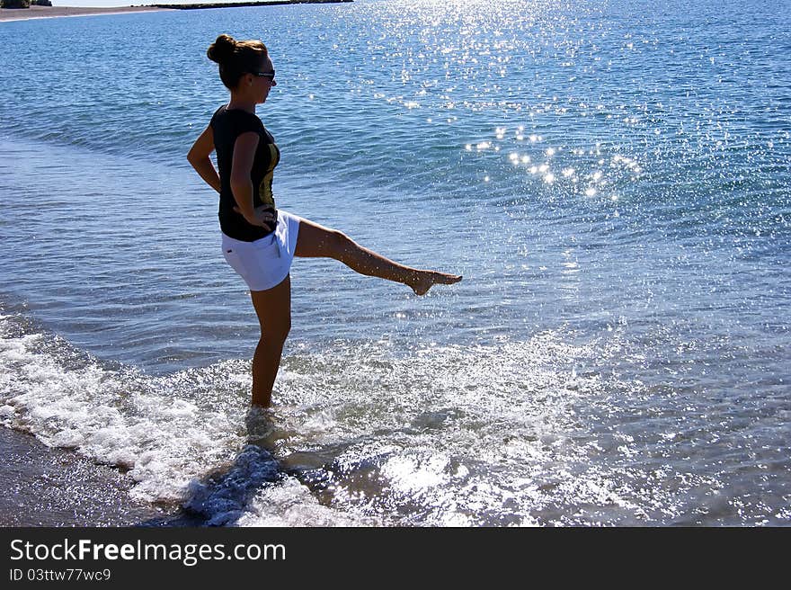 The girl playing with water