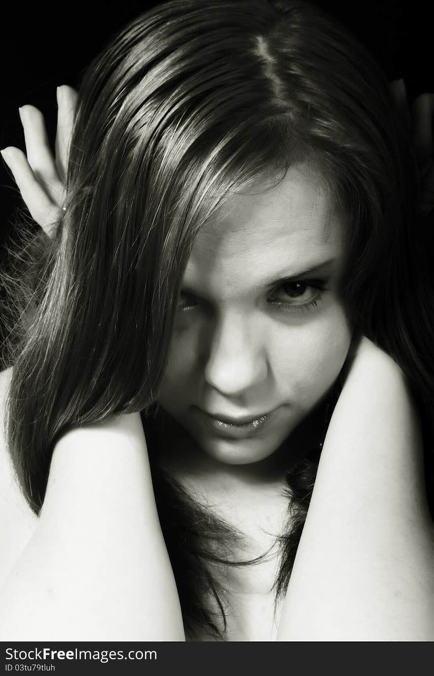 Contrast glamour shot of young woman in black and white. Contrast glamour shot of young woman in black and white