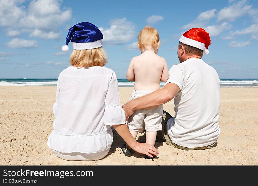 Happy family resting on the sea