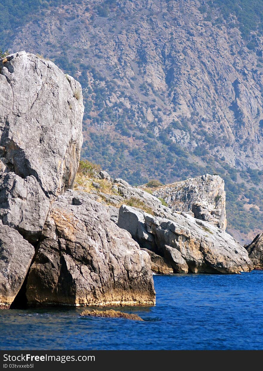 Mountain, rocks and sea