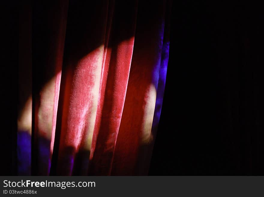 Light falling on the folds of a curtain. Light falling on the folds of a curtain