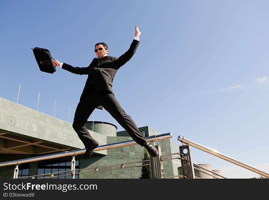 Businessman Jumping In The Street