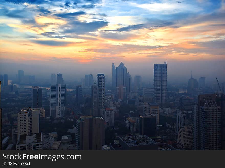 Top view building sunset time in the middle of Bangkok of Thailand