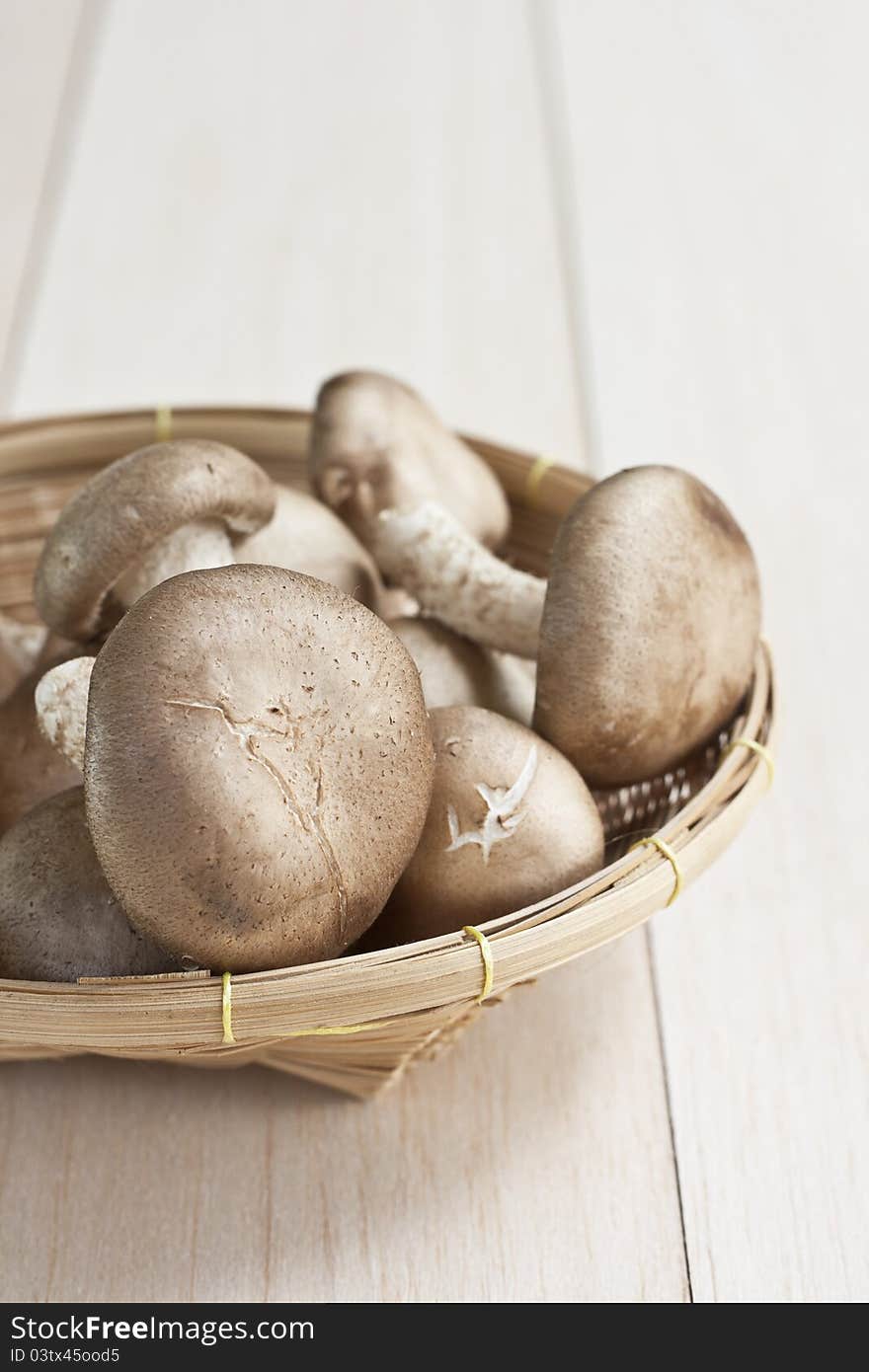 Fresh mushrooms on a wooden board