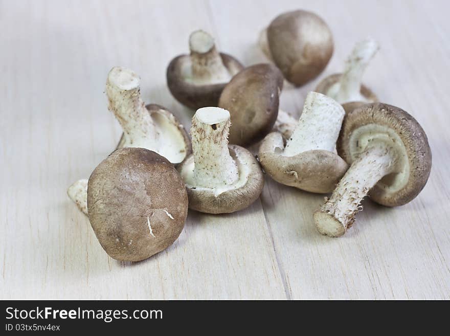 Fresh mushrooms on a wooden board