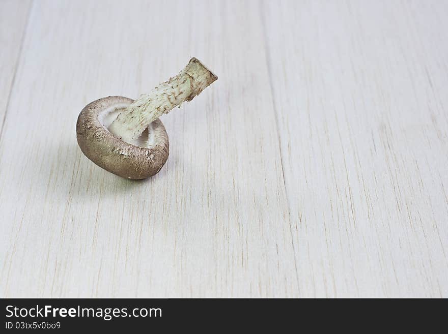 Fresh mushrooms on a wooden board