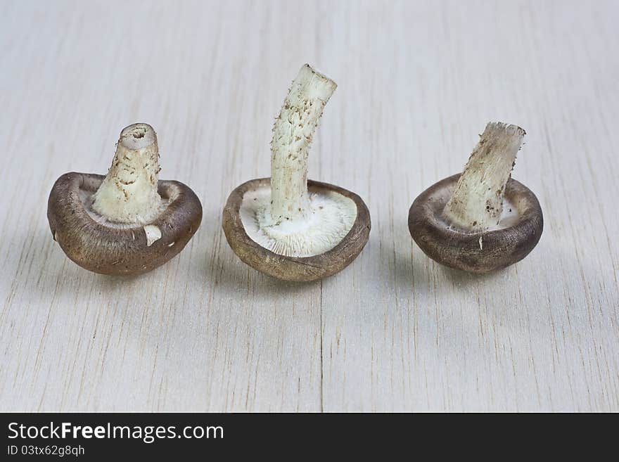 Fresh mushrooms on a wooden board