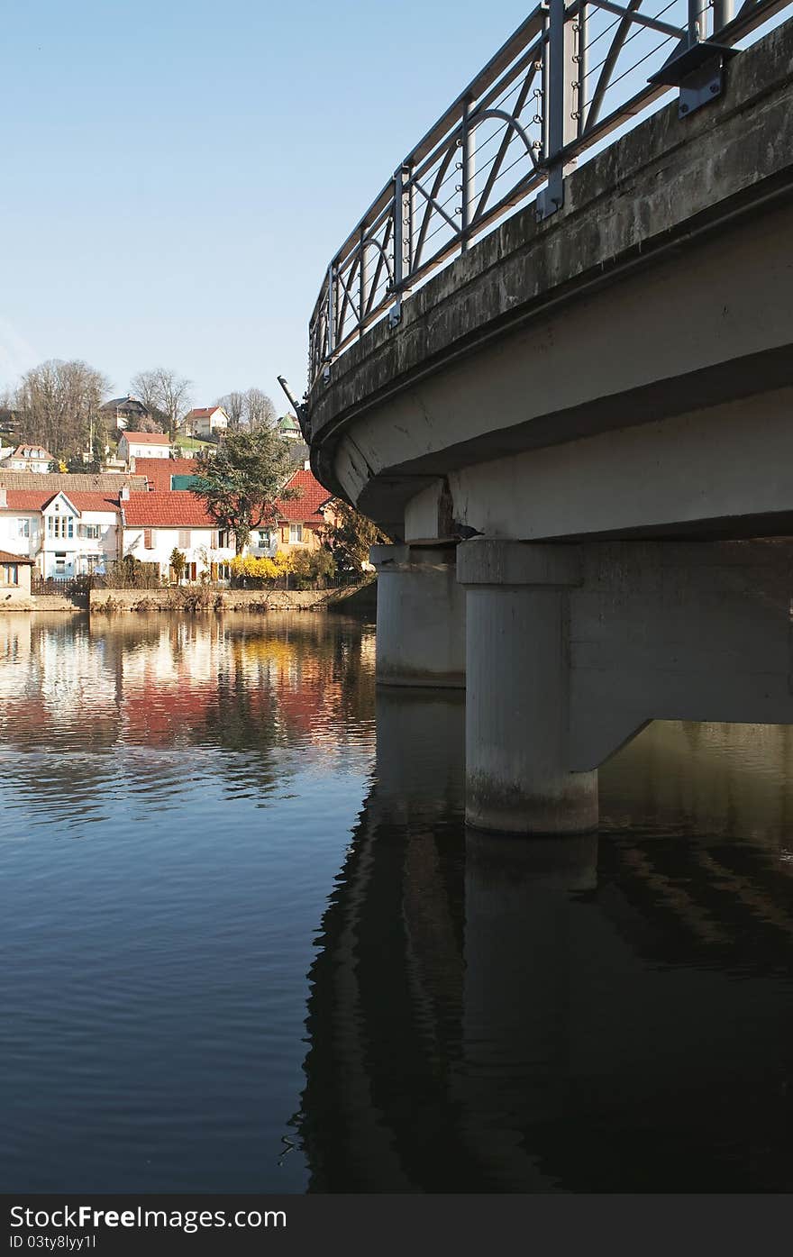 The city of Montbeliard, France. Reflection in the river. The city of Montbeliard, France. Reflection in the river.