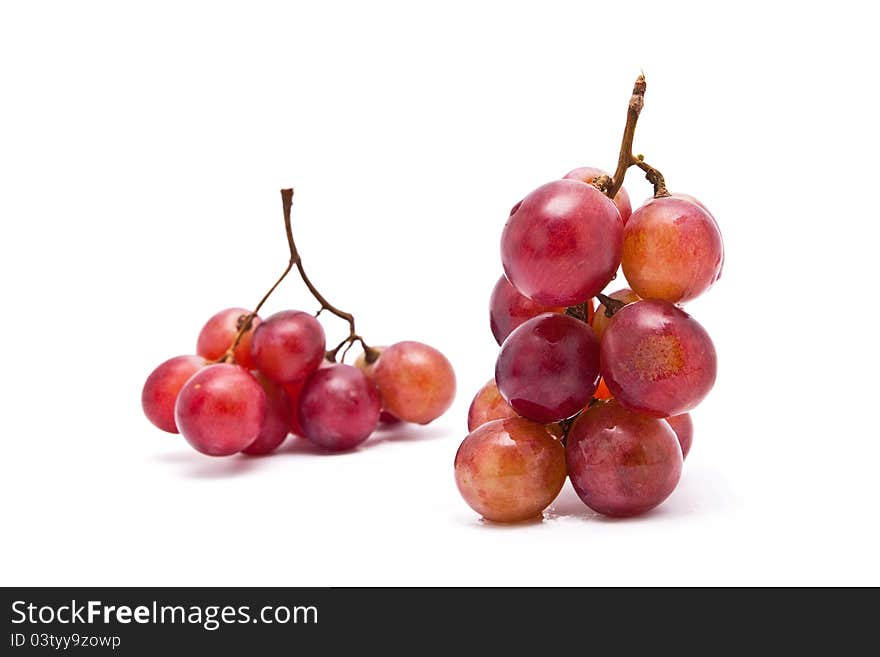 Bunch of red grapes isolated on white background