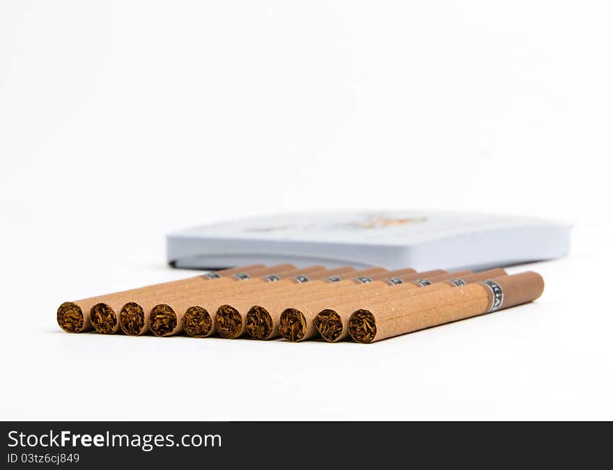 Cigarettes on the table on a white background