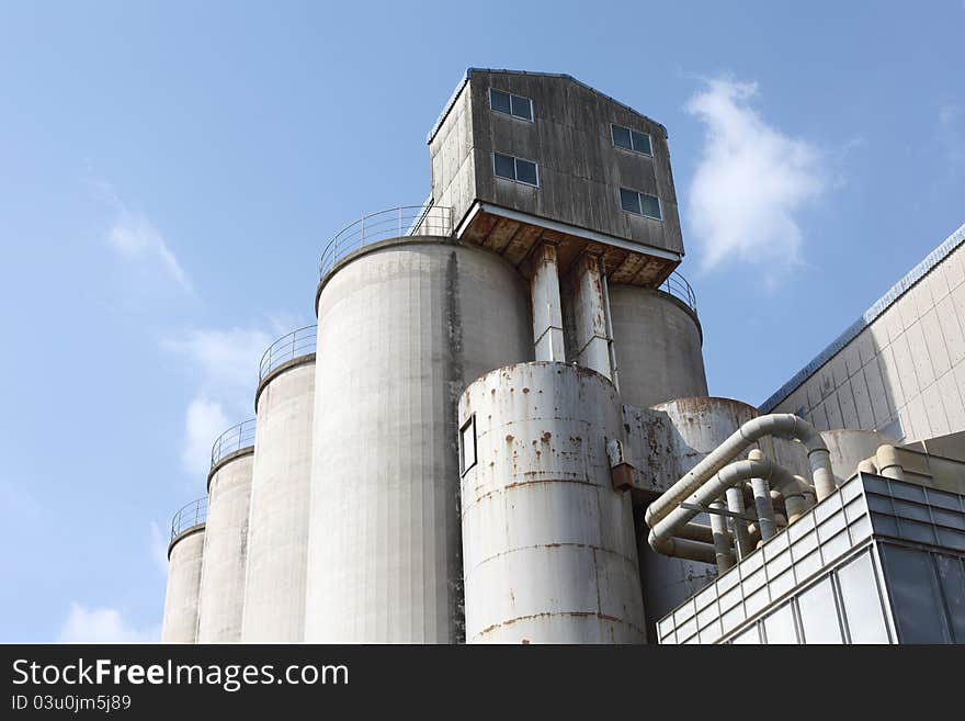 Photograph of storage silo and blue sky. Photograph of storage silo and blue sky