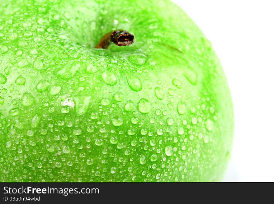 Water drop on green apple