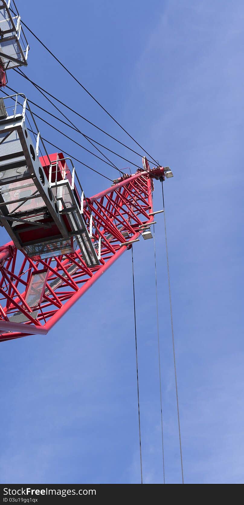 Detai of red crane in a port