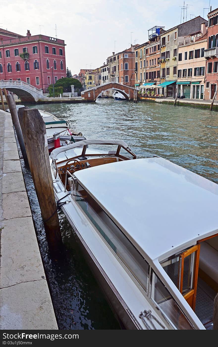 Boats on Venice channels and specific buidings