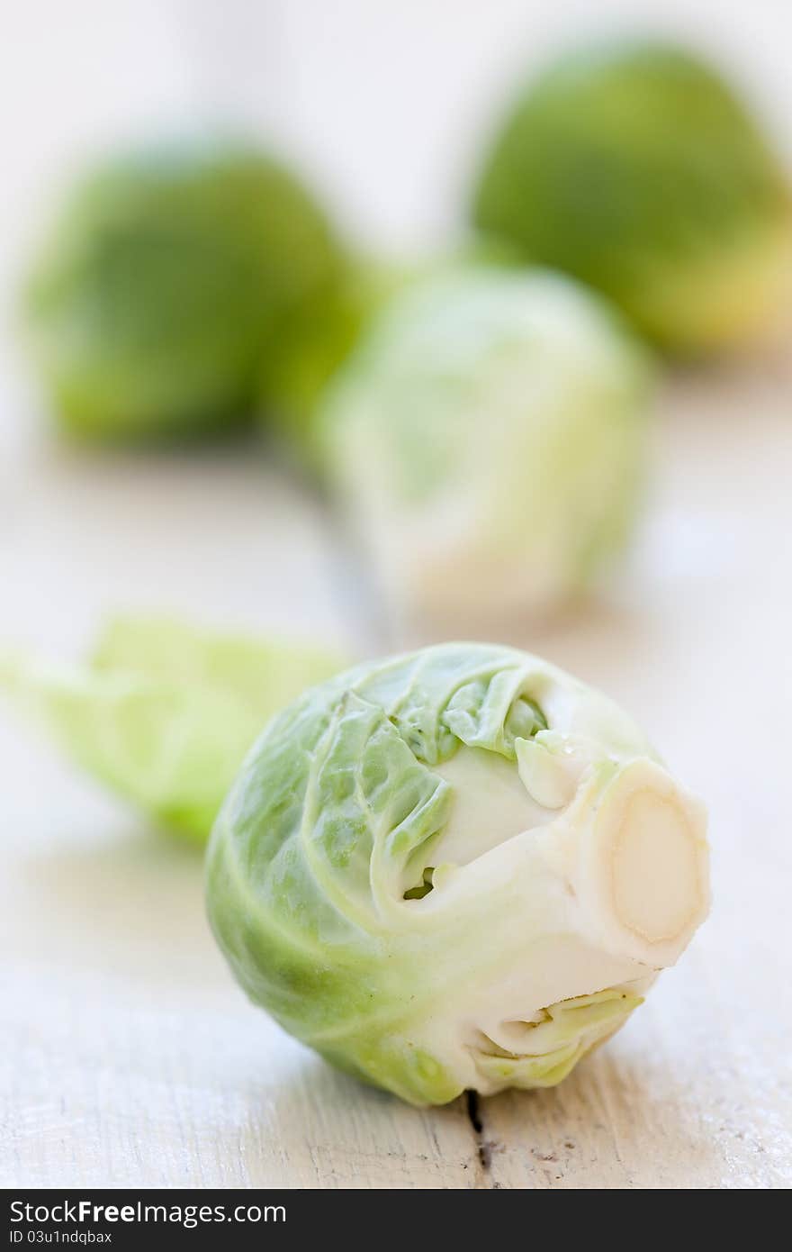 Fresh brussels sprouts on table closeup