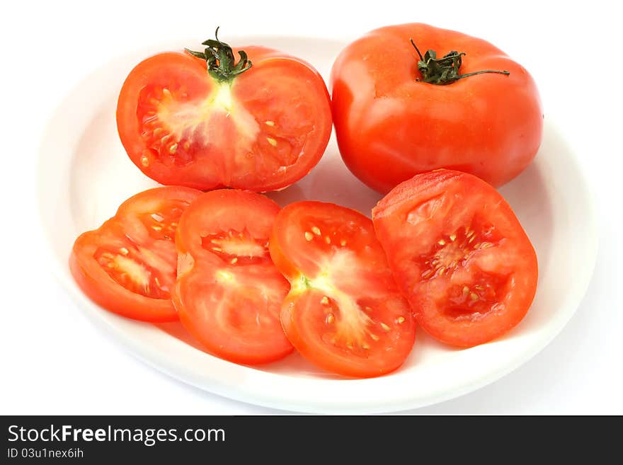 Red tomato vegetable with cut  on white background