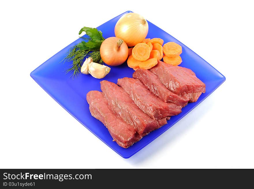 Fresh raw beef steak on a blue plate, on a white background. Fresh raw beef steak on a blue plate, on a white background