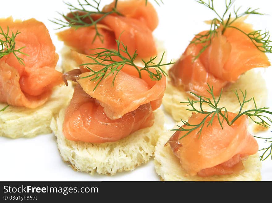 Fresh salmon slice on bread decorate with dill. Fresh salmon slice on bread decorate with dill