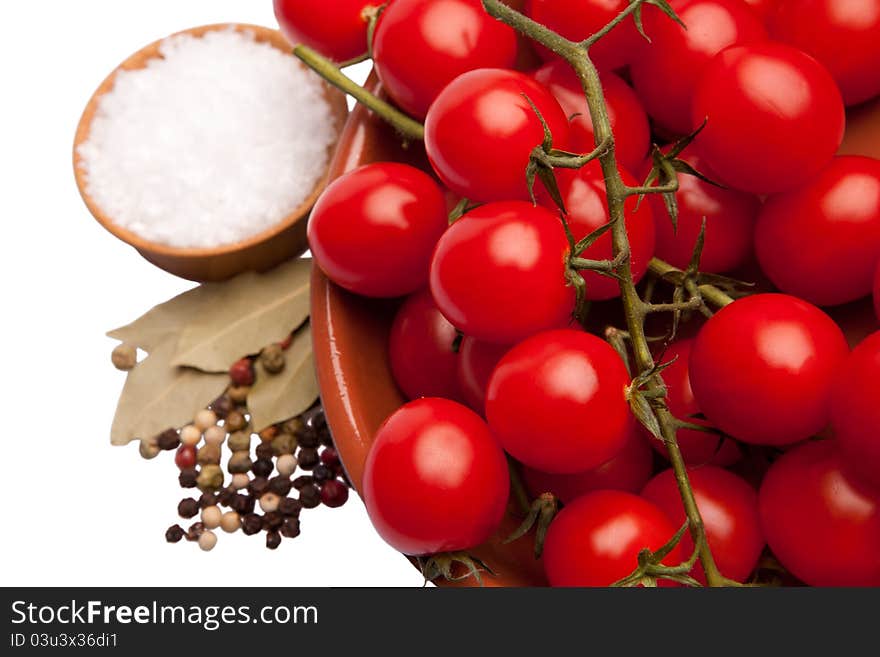 Cherry Tomatoes In A Bowl With Sea Salt And Pepper