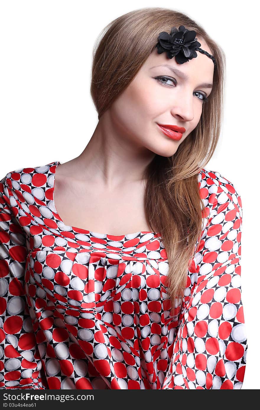 Portrait of a beautiful woman in a red dress on white background. Portrait of a beautiful woman in a red dress on white background