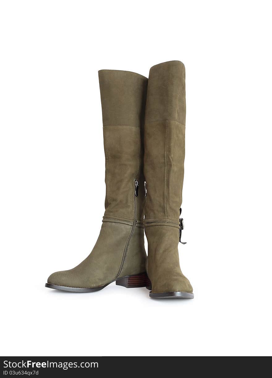 Nice new female olive green high boots. Isolated on white with clipping path. Nice new female olive green high boots. Isolated on white with clipping path